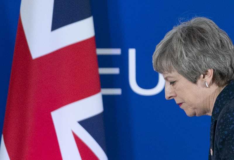 Photo of woman in front of Union Jack