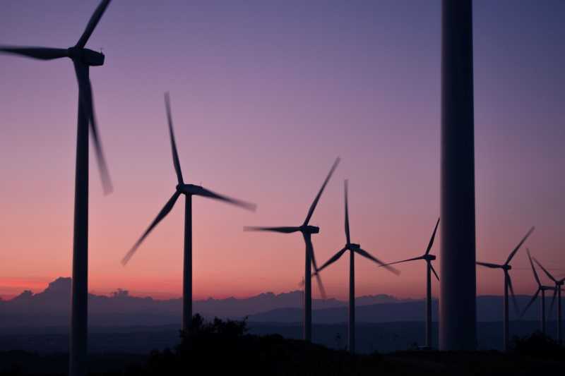 Wind turbines at sunset