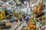 people shopping for fruit