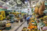 people shopping for fruit