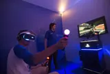 Photo of a person using Sony's VR glasses and PlayStation.